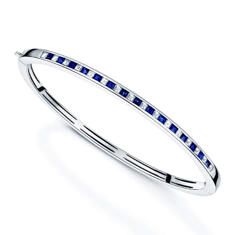 Women’s charm bracelets-18ct White Gold Sapphire And Diamond Bangle