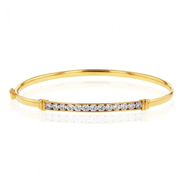 Women’s gold bracelets-9ct Yellow Gold Zirconia Channel Set Bar Hinged Bangle