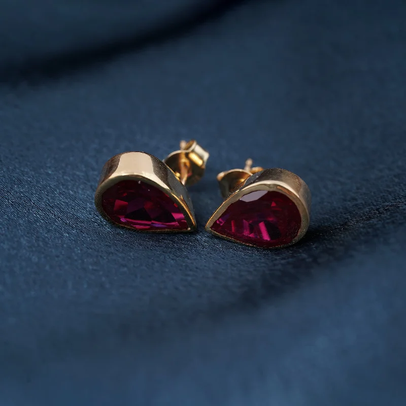 Women’s flower earrings-Golden Pear Shape Ruby Stud Earrings