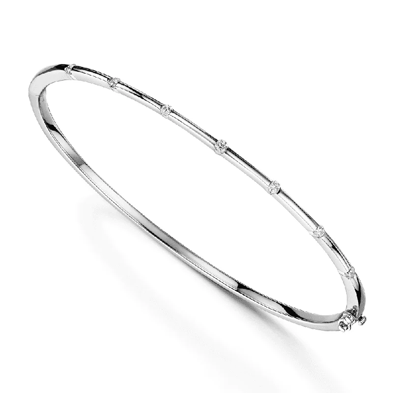 Women’s custom-made bracelets-18ct White Gold Round Brilliant Cut Diamond Set Hinged Polished Bangle