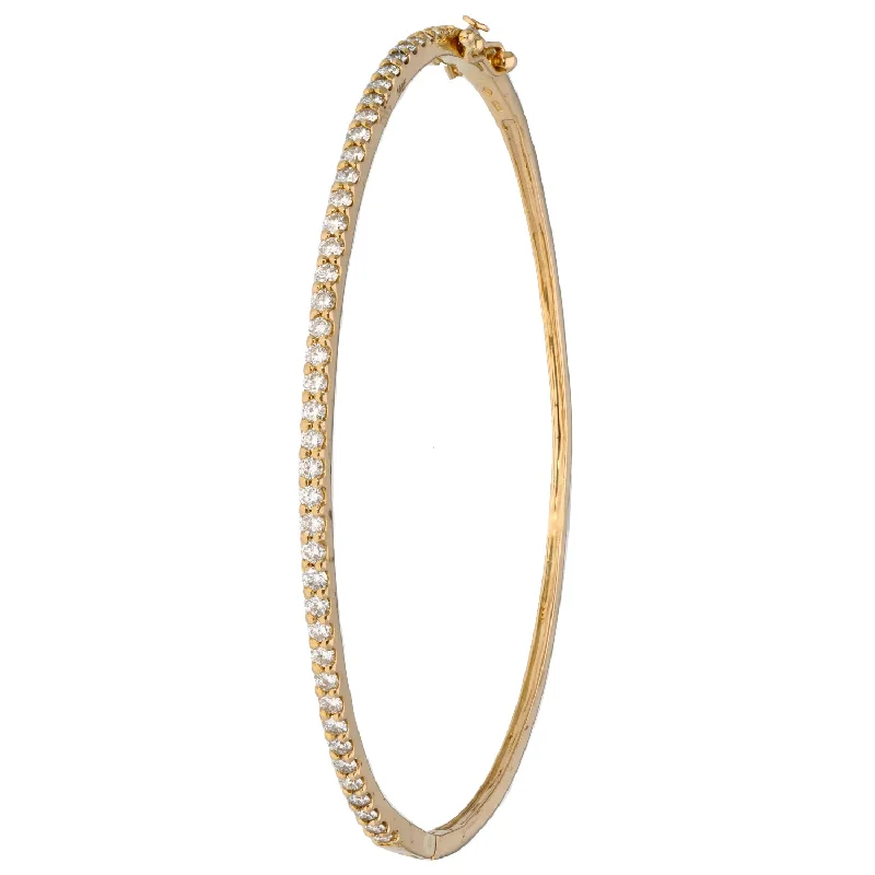 Women’s pearl and diamond bracelets-18ct Gold 0.82ct Diamond Hinged/Clasp Bangle