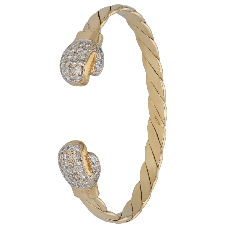 Women’s diamond tennis bracelets-9ct Gold Cubic Zirconia Torque Bangle