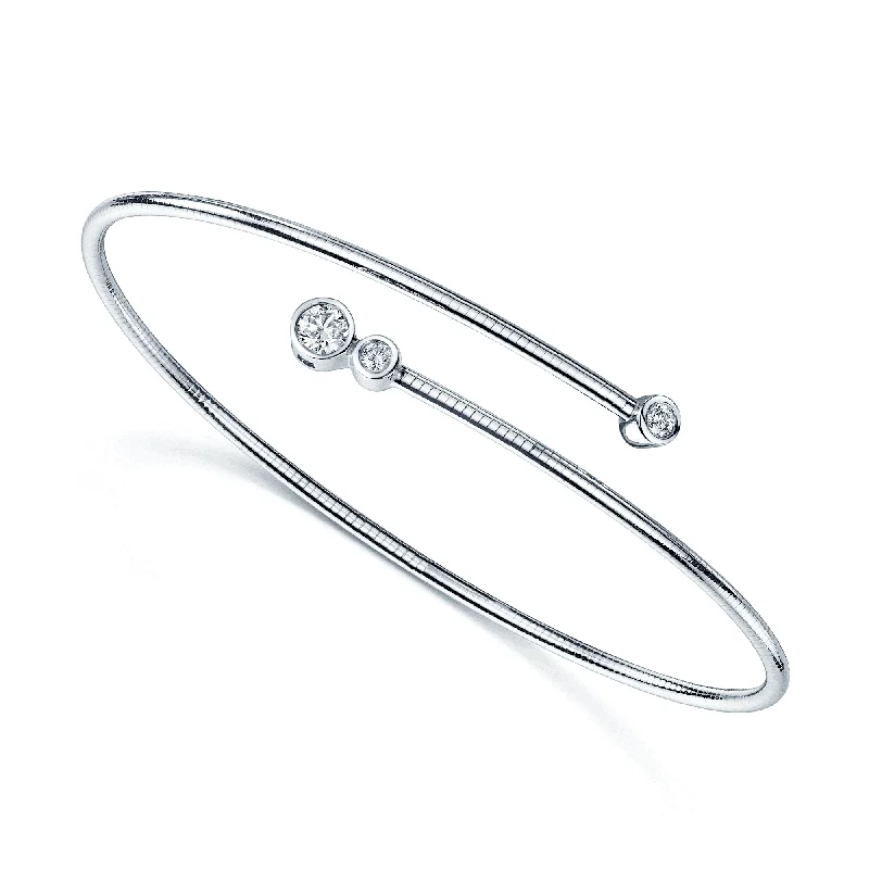 Women’s silver bangles-18ct White Gold Diamond Fancy Three Stone Rub Over Bangle