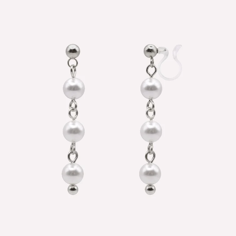 Women’s luxury earrings-TRIPLE PEARL DANGLE CLIP-ON EARRINGS IN SILVER