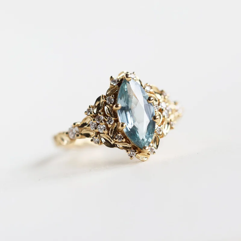 Women’s marquise engagement rings-Elara marquise aqua sapphire ring with leaf detail and diamonds