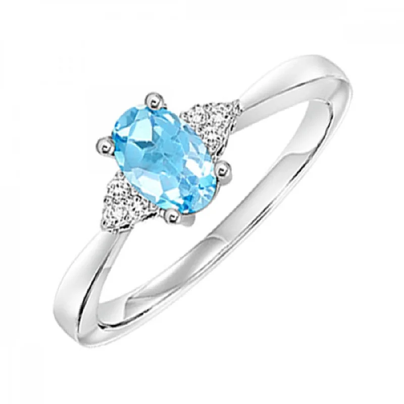 Women’s twisted band engagement rings-10k White Gold Oval Aquamarine and Diamond Ring